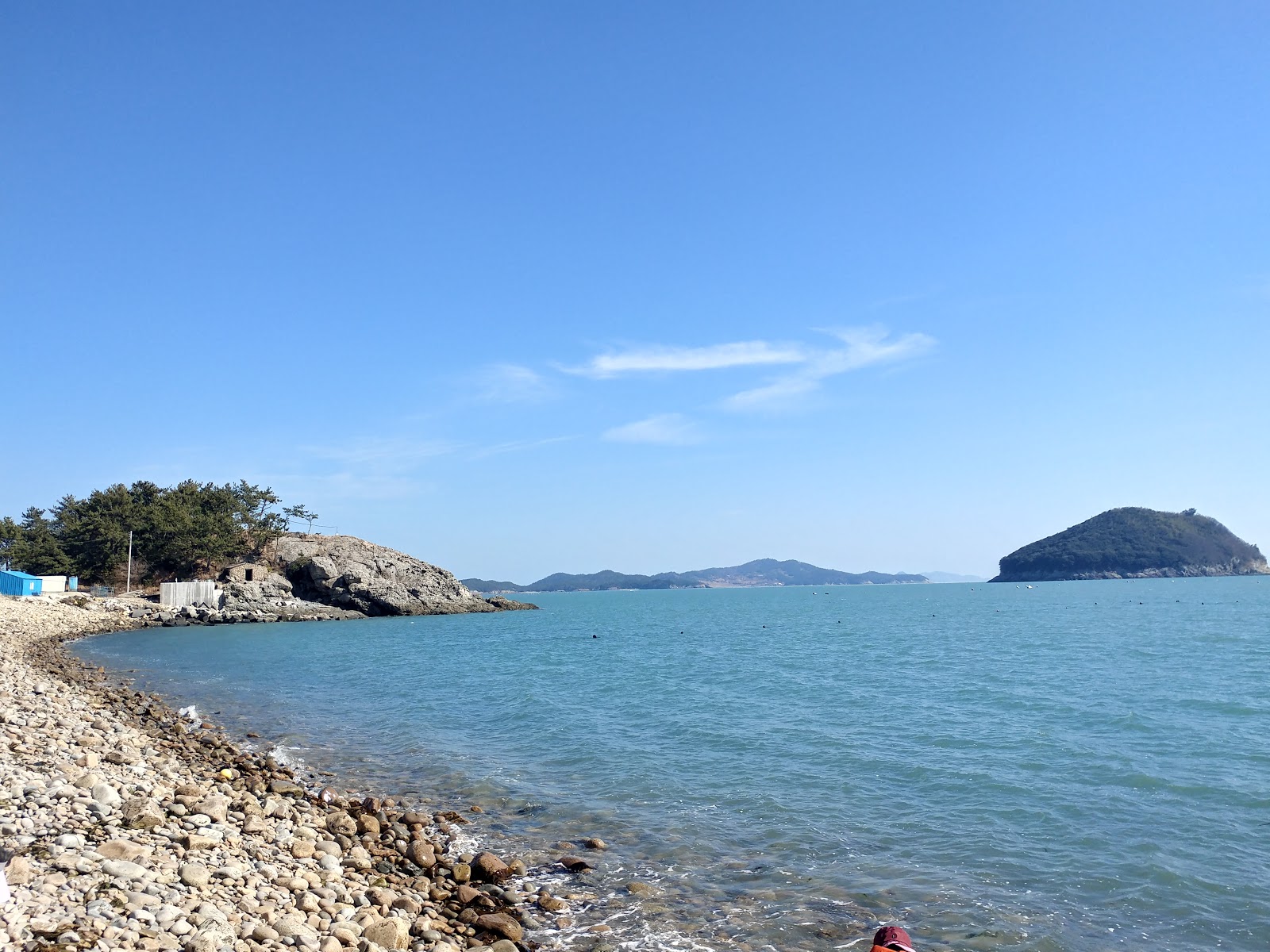 Ocheon Beach的照片 带有碧绿色纯水表面