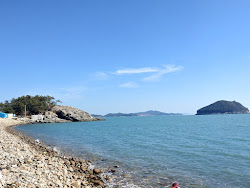 Ocheon Beach'in fotoğrafı düz bir kıyı şeridi ile birlikte