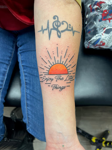 Find camping tattoo ideas for your next unique tattoo in Cheyenne at The T.R.I.B.E. Zoo, LLC Tattoo