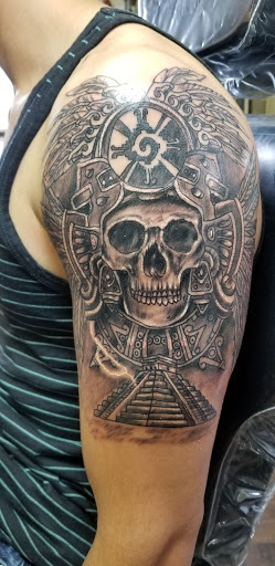 Explore electric guitar tattoo ideas, creative tattoo ideas in Wenatchee, available at Rebels Tattoo Studio