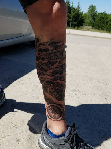 Explore genesis tattoo ideas, creative tattoo ideas in Rowlett, available at Fresh Image Tattoo Studios