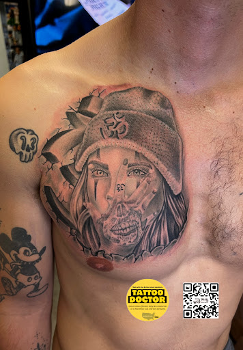 Explore blackout hand tattoo ideas, creative tattoo ideas in Milwaukee, available at West Allis Tattoo & Gallery Tattoo Shop Milwaukee