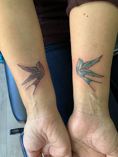 Explore small forearm tattoo ideas for men, creative tattoo ideas in Lincoln City, available at Black N Blue Tattoo & Skate Shop