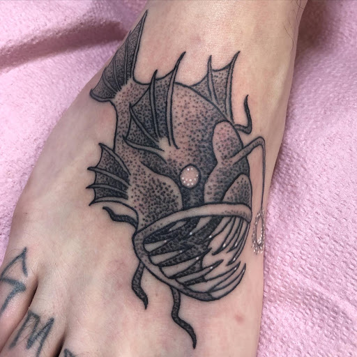 Explore tattoo geometric ideas, creative tattoo ideas in Everett, available at Tattoosmith & Company