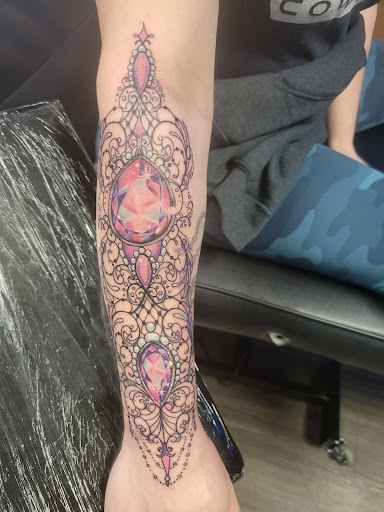 Explore tattoo ideas for women's lower back, creative tattoo ideas in Round Rock, available at Beto Tats