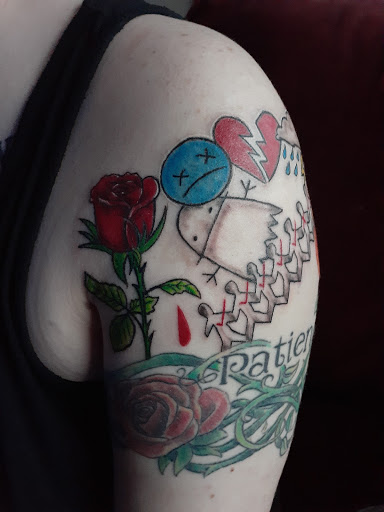 Explore snake tattoo ideas, creative tattoo ideas in Covington, available at Arts Ink Tattoo Studio