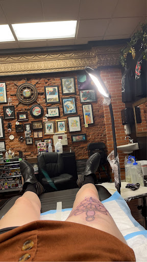 Explore lion and the lamb tattoo ideas, creative tattoo ideas in Dubuque, available at The Crows Nest