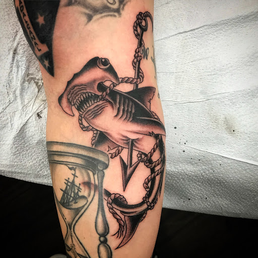 Explore red hand tattoo ideas, creative tattoo ideas in Twentynine Palms, available at Hilltop Tattoo Company