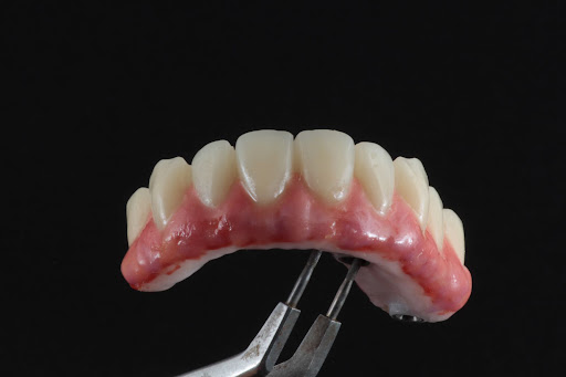 Logo da empresa - Laboratório de Prótese Dentária