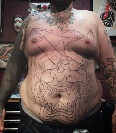 Explore haunted mansion tattoo ideas, creative tattoo ideas in San Diego, available at Sideshow Tattoo and Piercing