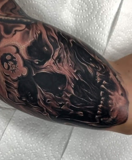 Explore ankle tattoo ideas for men, creative tattoo ideas in San Antonio, available at Firme Copias Tattoo Studio