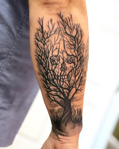 Explore undertaker tattoo ideas, creative tattoo ideas in Batavia, available at The Pretty Pin-Up Tattoo Parlor
