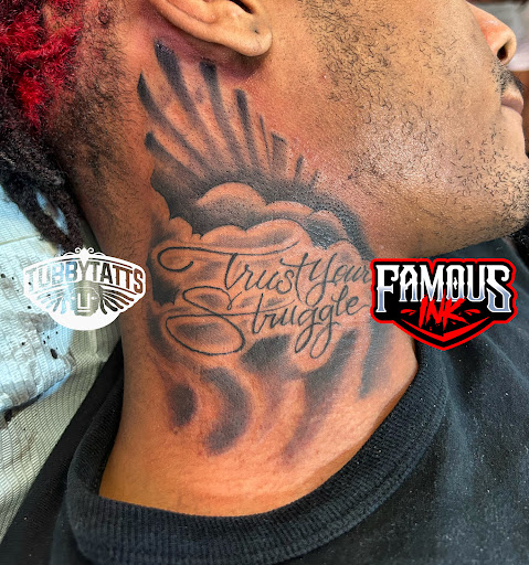 Find cute cat tattoo ideas for your next unique tattoo in Hammond at Famous Ink, Inc.