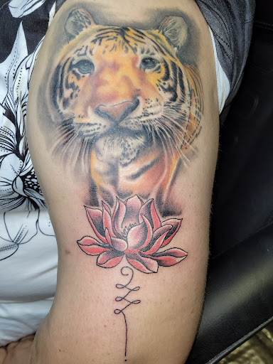 Explore cm punk tattoo ideas, creative tattoo ideas in Angola, available at Hoodlum Ink