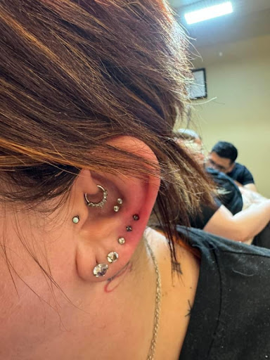 Explore one direction tattoo ideas, creative tattoo ideas in New Hampton, available at Crescent Moon Tattoo