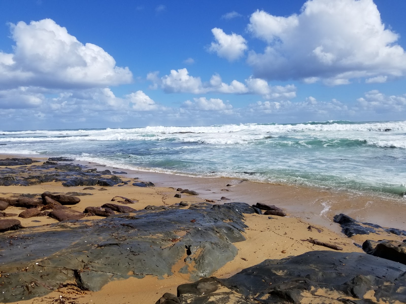 Foto van Wreck Beach met turquoise puur water oppervlakte