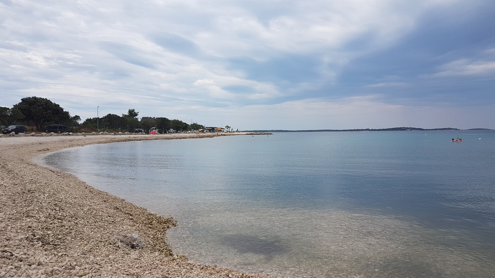 Zdjęcie Portic beach z przestronna zatoka