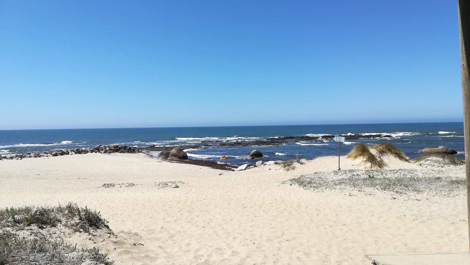 Praia de Carreco'in fotoğrafı düz ve uzun ile birlikte