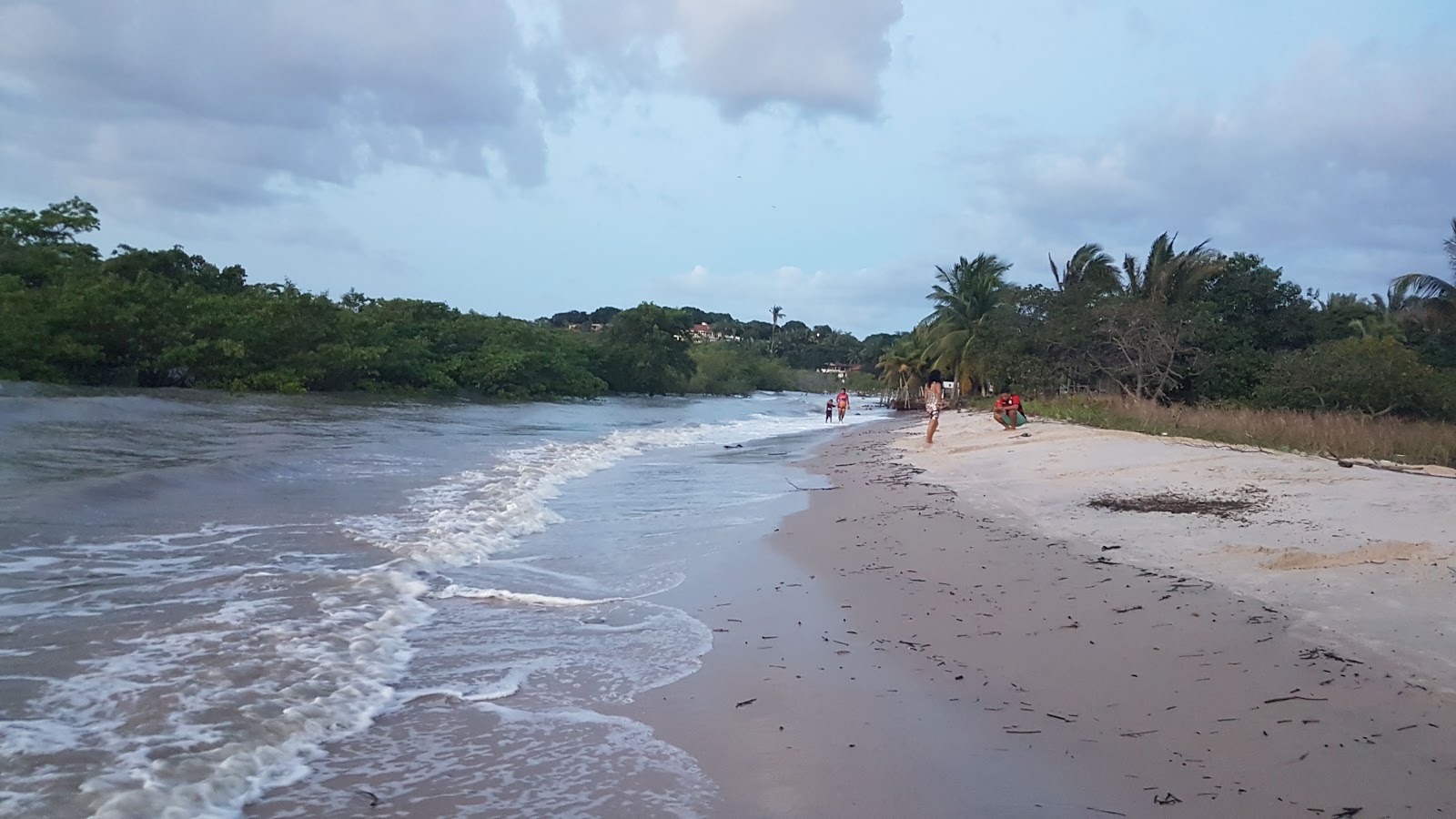 Foto av Praia da Guia med ljus sand yta