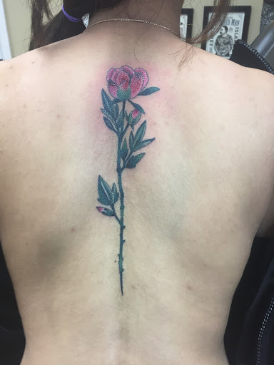 Explore small dragonfly tattoo ideas, creative tattoo ideas in Liberty, available at Dark Lotus Tattoo & Salon