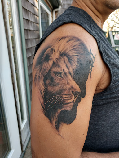 Explore risk taker tattoo ideas, creative tattoo ideas in Portsmouth, available at Inflicting Ink, LLC