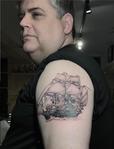 Explore tattoo ideas for women on thigh, creative tattoo ideas in New York, available at Red Baron Ink Tattoo and Piercing