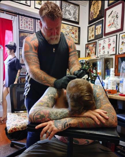 Explore parrot tattoo ideas, creative tattoo ideas in Strasburg, available at Champion Tattoo Company