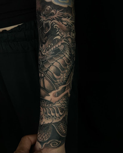 Explore anti government tattoo ideas, creative tattoo ideas in Dorchester, available at Holistic Ink Boston Tattoo Shop