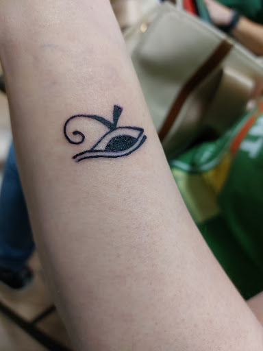 Explore scroll tattoo ideas, creative tattoo ideas in Dayton, available at 33 Lions Tattoo
