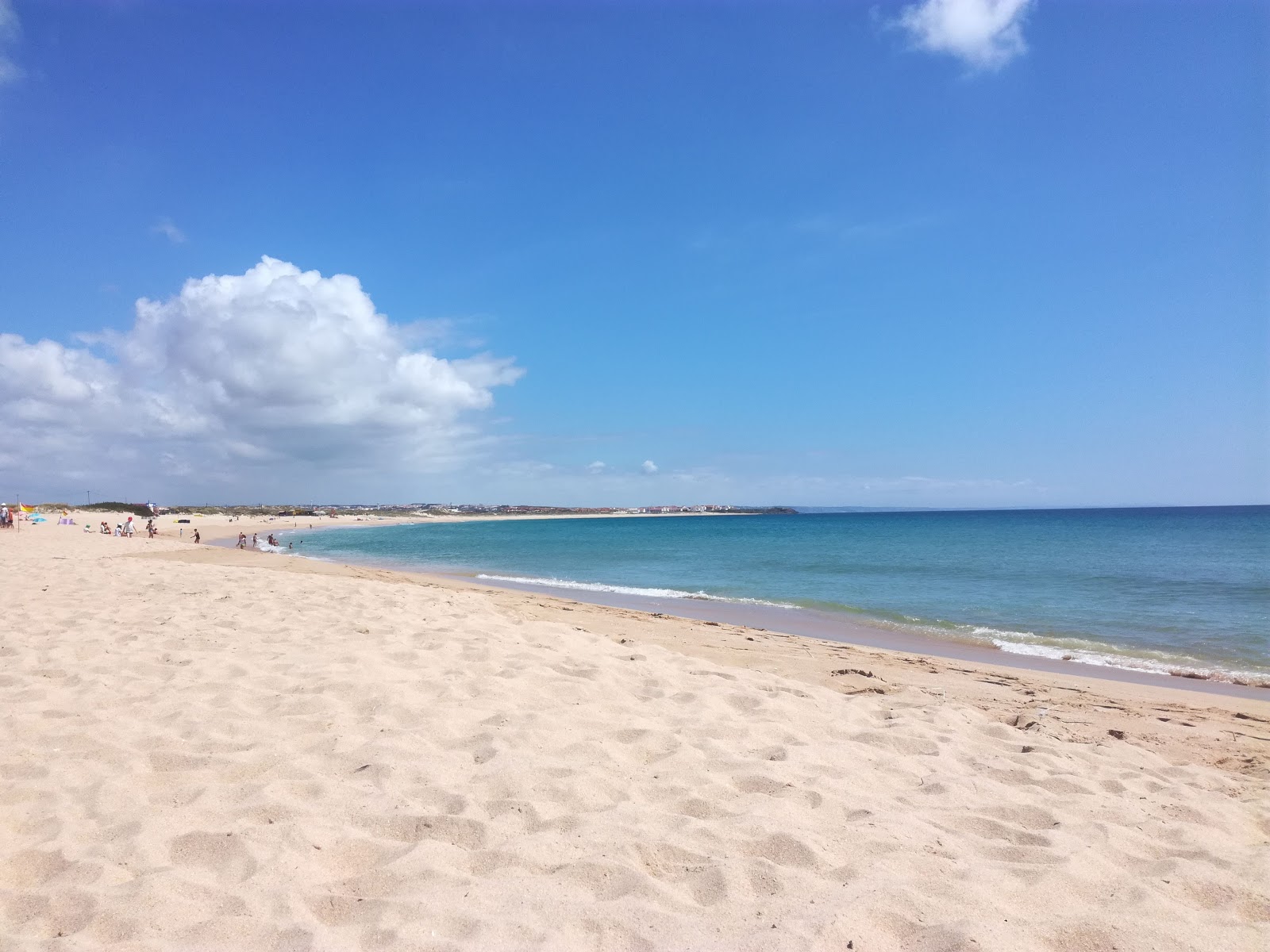 Fotografie cu Praia da Consolacao cu drept și lung