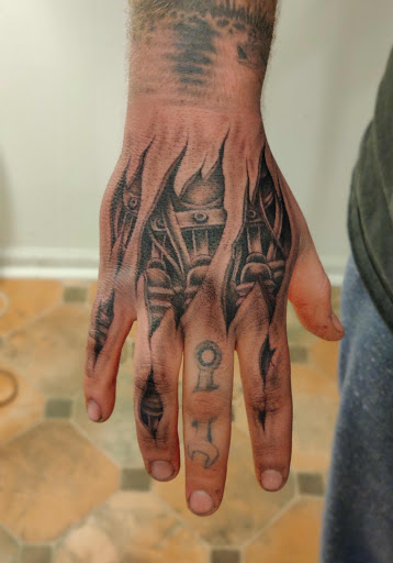 Explore women hand tattoo ideas, creative tattoo ideas in Hebron, available at Explosive Ink Tattoo