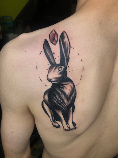 Explore solar eclipse tattoo ideas, creative tattoo ideas in Atlanta, available at Iron Palm Tattoos & Body Piercing Atlanta