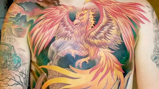 Explore female stomach tattoo ideas, creative tattoo ideas in Peoria, available at Iron Key Tattoo Studio Inc.