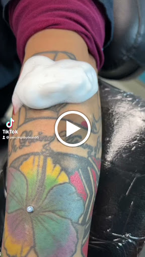 Explore cartoon tattoo ideas for men, creative tattoo ideas in Bay Shore, available at Piercings By Dean 95