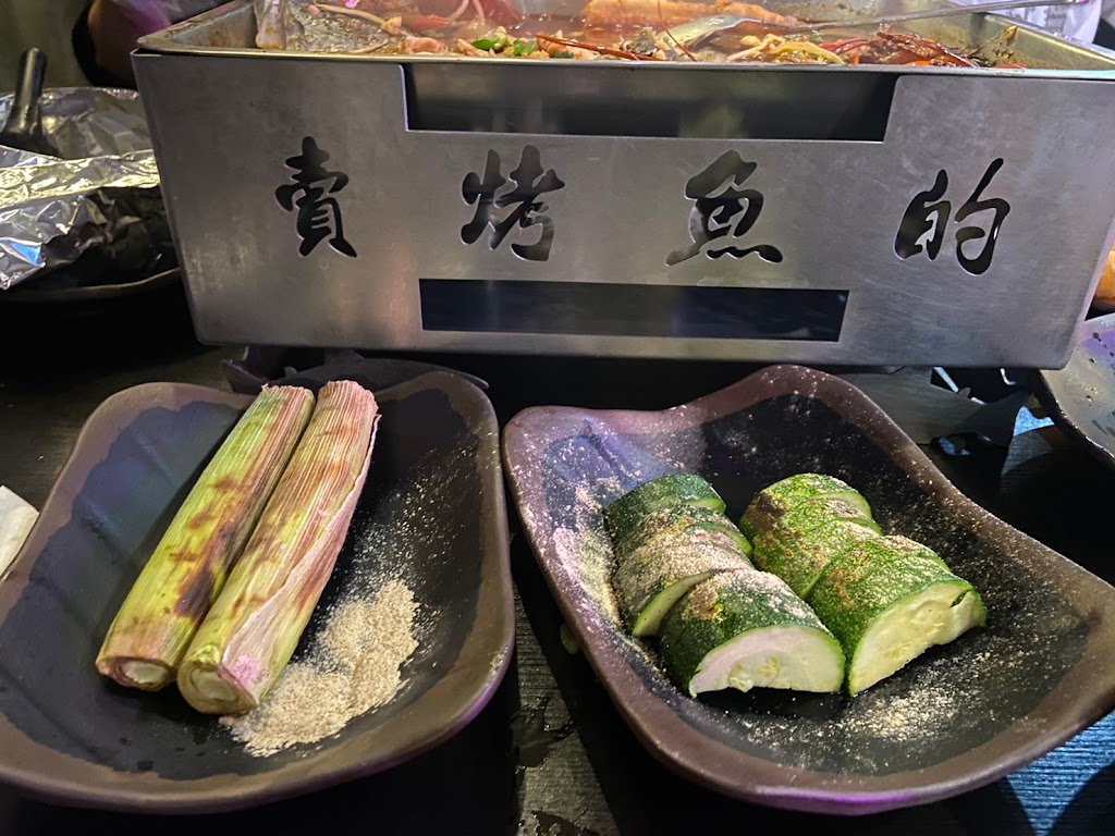賣烤魚的。 的照片