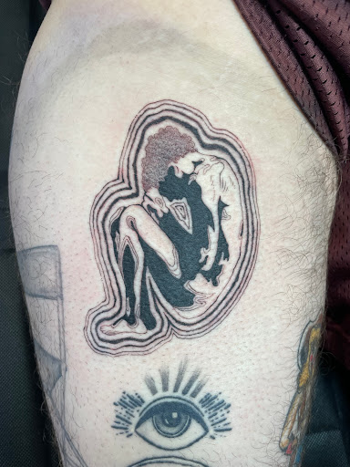 Explore spina bifida tattoo ideas, creative tattoo ideas in Anaheim, available at Autumn Moon Tattoo