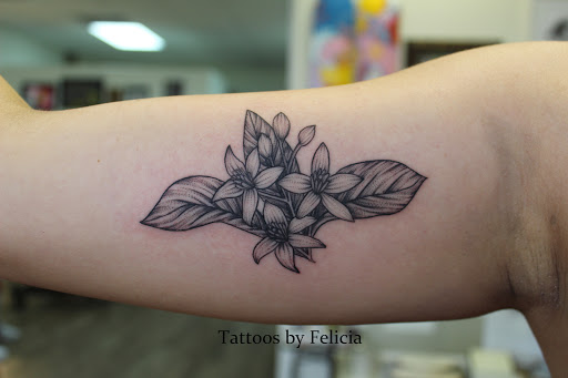 Explore dopamine tattoo ideas, creative tattoo ideas in Fort Myers, available at Tiger Lotus Tattoo and Piercing