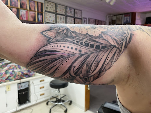 Explore trout tattoo ideas, creative tattoo ideas in Saint Paul, available at Gabriels Fallen Angel Tattoo Studio