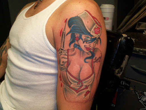 Explore lower back tattoo cover up ideas, creative tattoo ideas in Pelham, available at Tattoo Fever