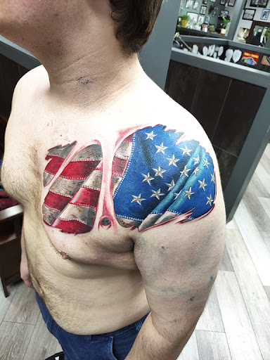 Explore tattoo ideas over scars, creative tattoo ideas in Nashville, available at Titan Tattoo