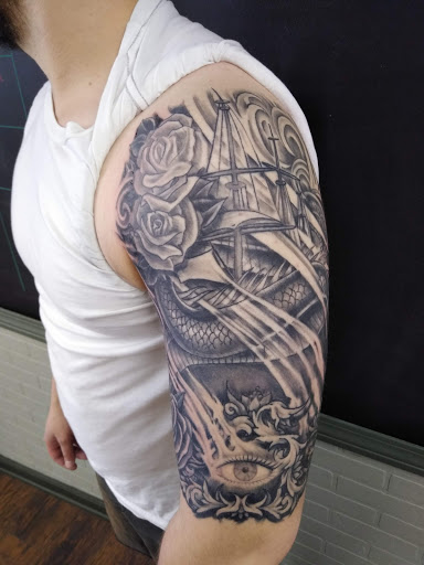 Explore tattoo cover up ideas for dark tattoos, creative tattoo ideas in Warren, available at Aces Tattoo & Body Piercing