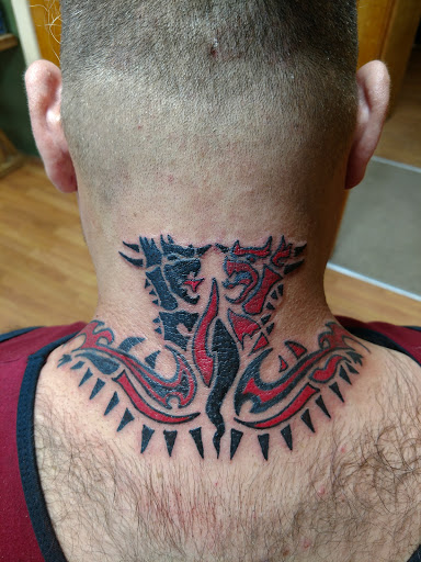 Explore ring finger tattoo cover up ideas for guys, creative tattoo ideas in Erie, available at Wayward Tattoo Studio