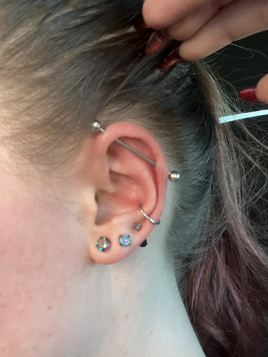 Find tattoo ideas under breast for your next unique tattoo in Mesa at Ink Mafia Tattoo & Piercing