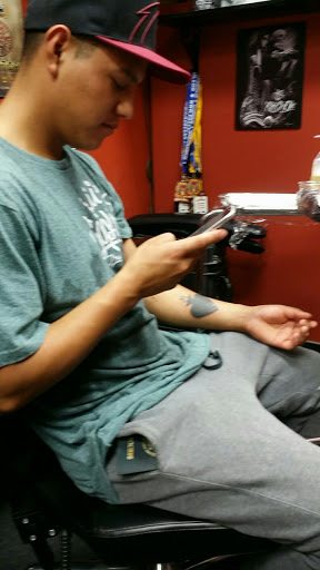 Tattoo Shop «Symbolic Tattoo», reviews and photos, 551 W Douglas Ave, Wichita, KS 67201, USA