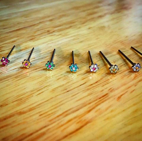 Explore small coraline tattoo ideas, creative tattoo ideas in San Diego, available at Sideshow Tattoo and Piercing