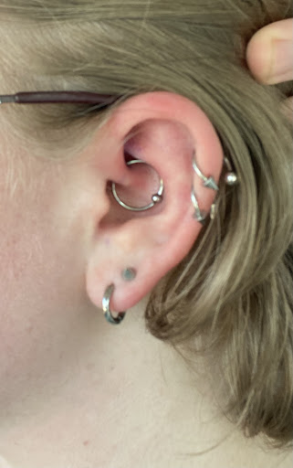 Explore name tattoo ideas on neck, creative tattoo ideas in Brandon, available at Hot Box Tattoos