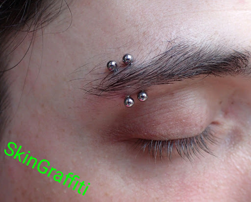 Explore tattoo ideas for women's legs, creative tattoo ideas in Athens, available at SkinGraffiti Tattoo & Piercing