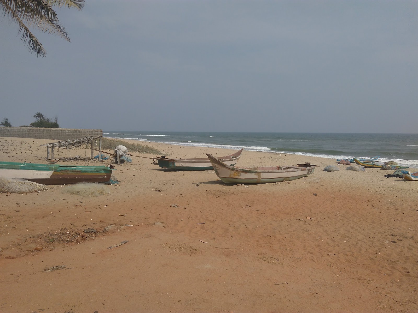 Foto van Koovathur Beach en de nederzetting