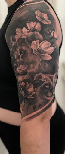 Explore lion tattoo ideas, creative tattoo ideas in Weatherford, available at Weatherford Tattoo Co.