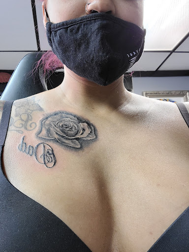 Explore red string of fate tattoo ideas, creative tattoo ideas in Philadelphia, available at Daves Artistic Tattoo
